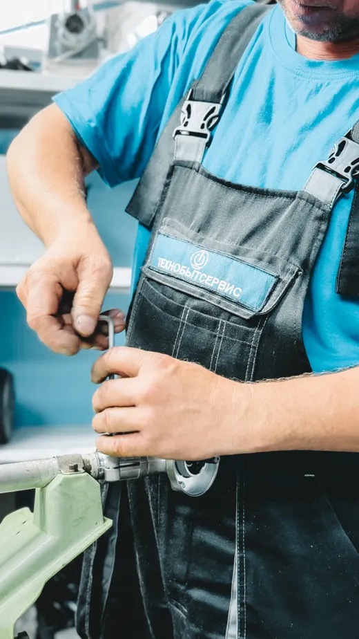 Plumber working on a pipe connection
